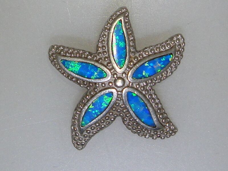 Sterling silver starfish pendant with iridescent opal inlay