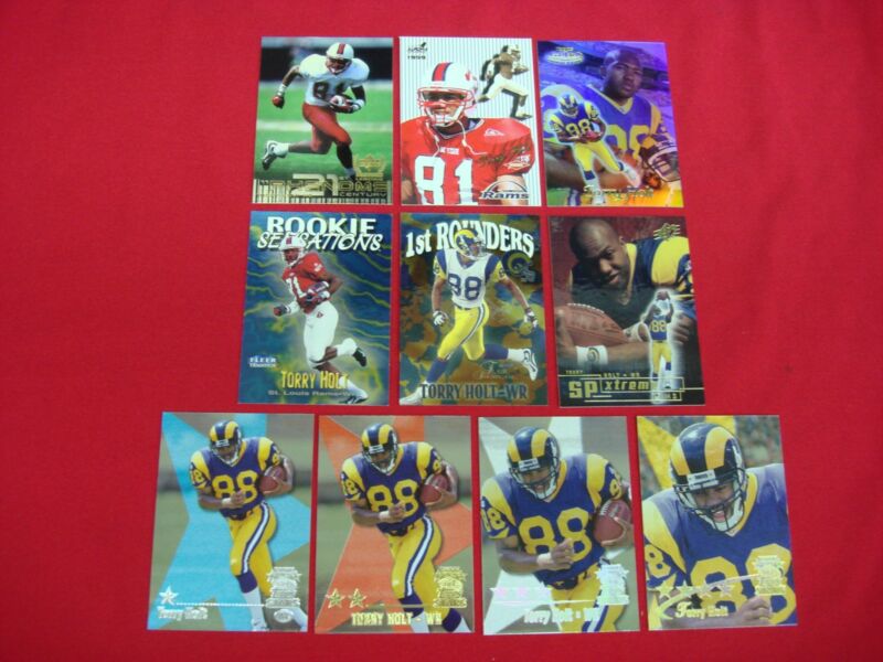 Torry Holt rookie football card collection of 10 cards, including all 4 Topps Star Parallels