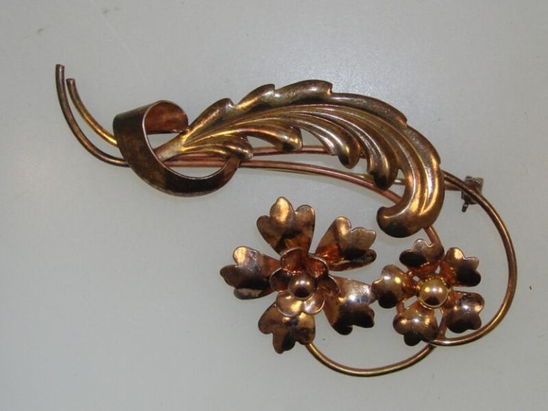 Vintage 1940s floral pin with rose and yellow gold tone on silver by Carl Art