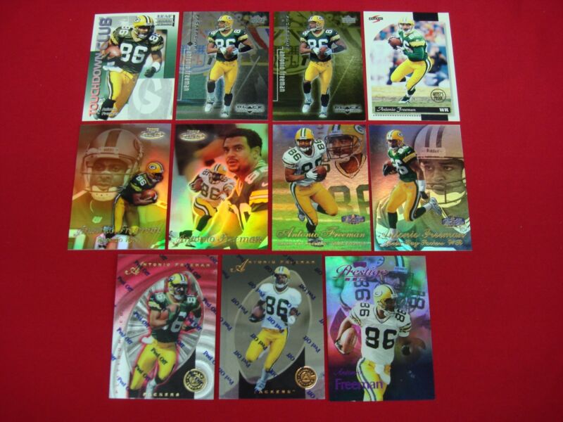 Collection of 11 Antonio Freeman football cards, featuring serial numbers, parallels, inserts and foils.