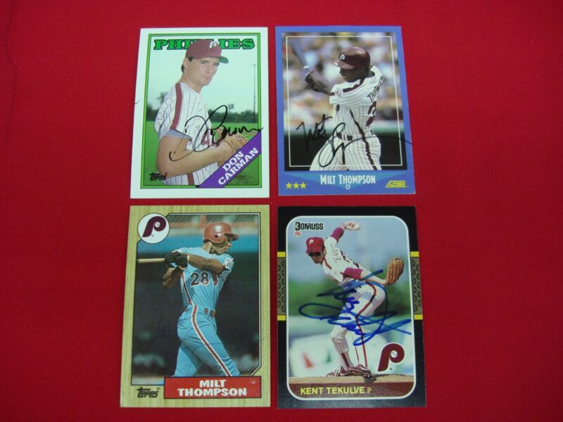 Four autographed Philadelphia Phillies baseball cards from 1987-1988 featuring iconic players