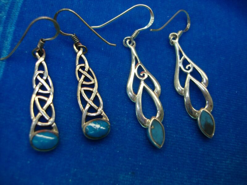 Sterling silver dangle earrings set with unique turquoise stones, 1.75" length