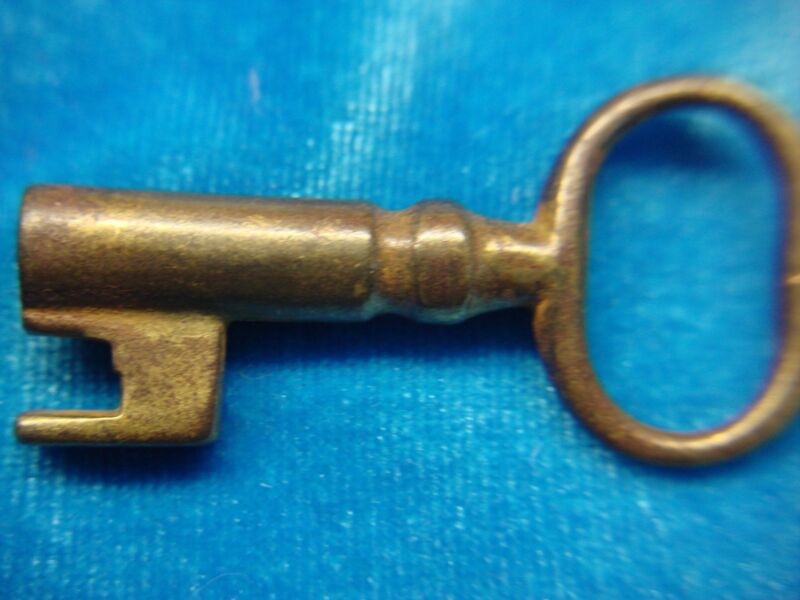Vintage steel hollow barrel stub key with brass wash