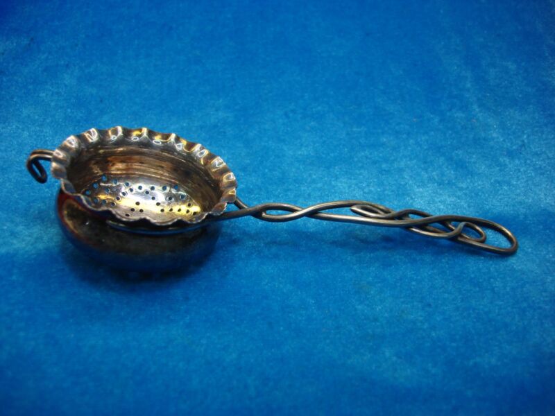 Vintage silver plate tea strainer