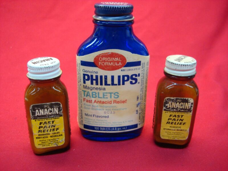 Set of 3 vintage pharmaceutical bottles including Anacin and Phillips' Milk of Magnesia