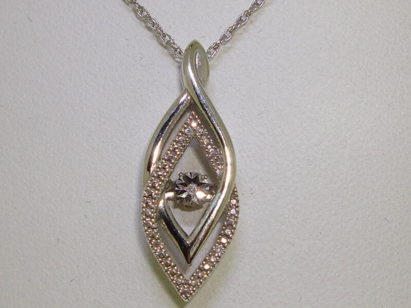 Sterling silver floating diamond pendant necklace by TOC