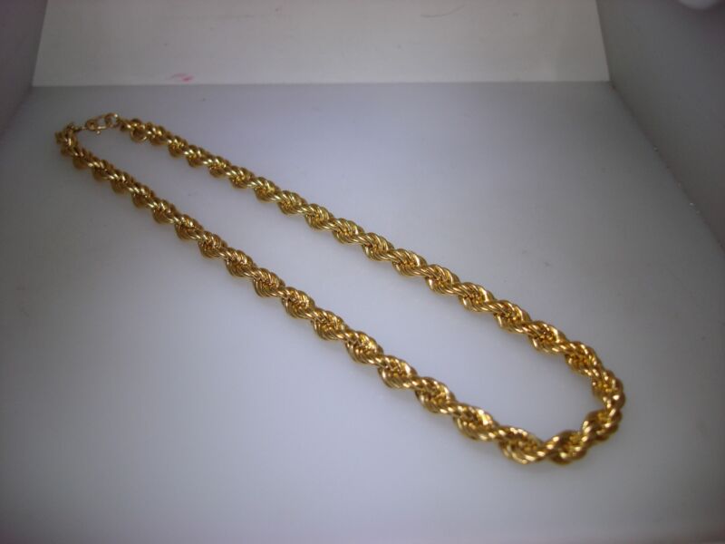 Vintage Monet gold tone choker necklace with heavy rope link design