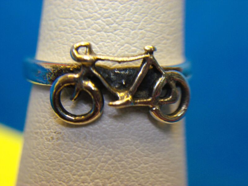 Sterling silver ring with a bicycle design, size 5.5