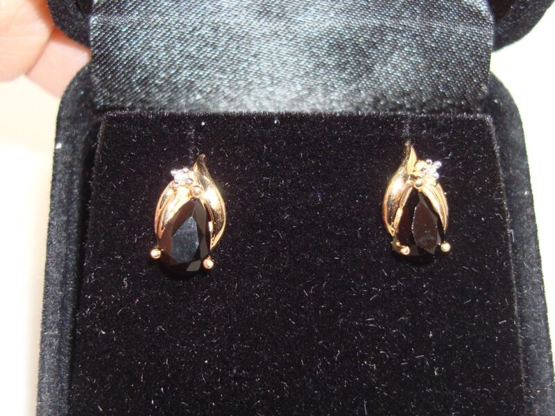 Elegant 14K gold onyx and diamond earrings