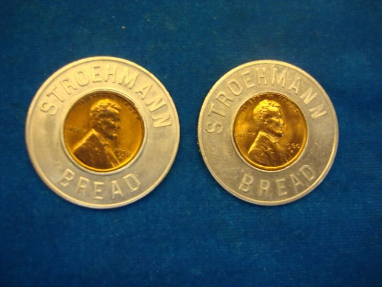Pair of Stroehmann Bread Lucky Medals with encased Lincoln Cents (Brilliant Uncirculated)