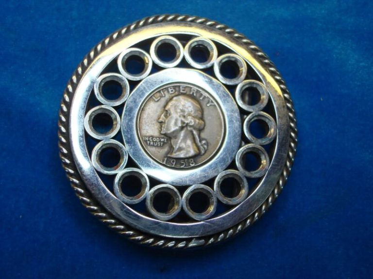 Artisan crafted Western buckle with a 1958-D silver quarter