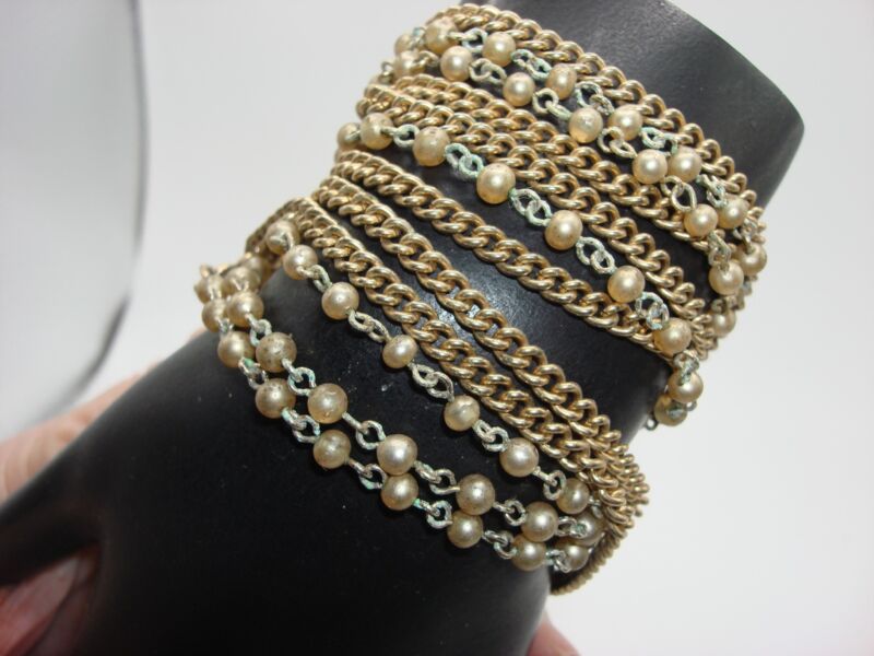 Vintage multi-strand faux pearl and gold tone chain bracelet