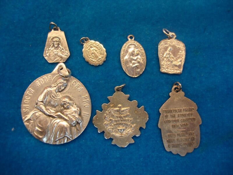 Vintage religious medals and charms in antique silver tone, estate lot