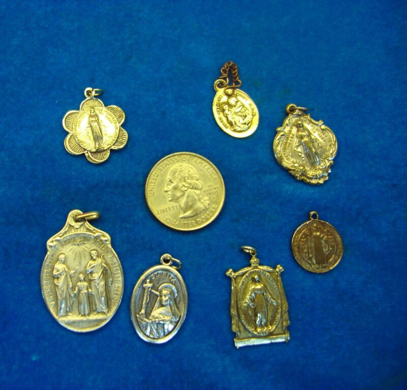 Vintage religious medals and charms from an estate sale