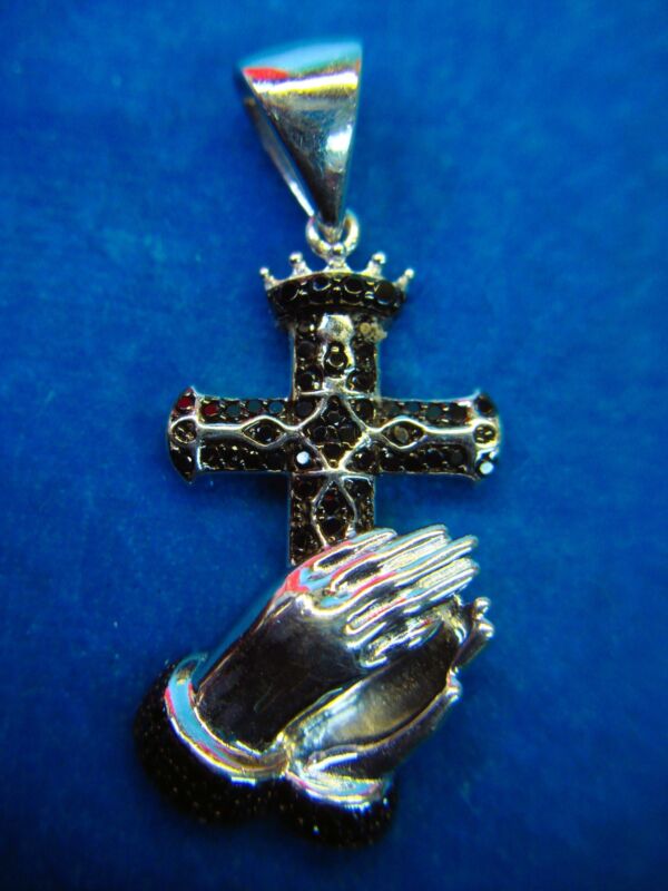 Sterling silver cross pendant with spinel praying hands
