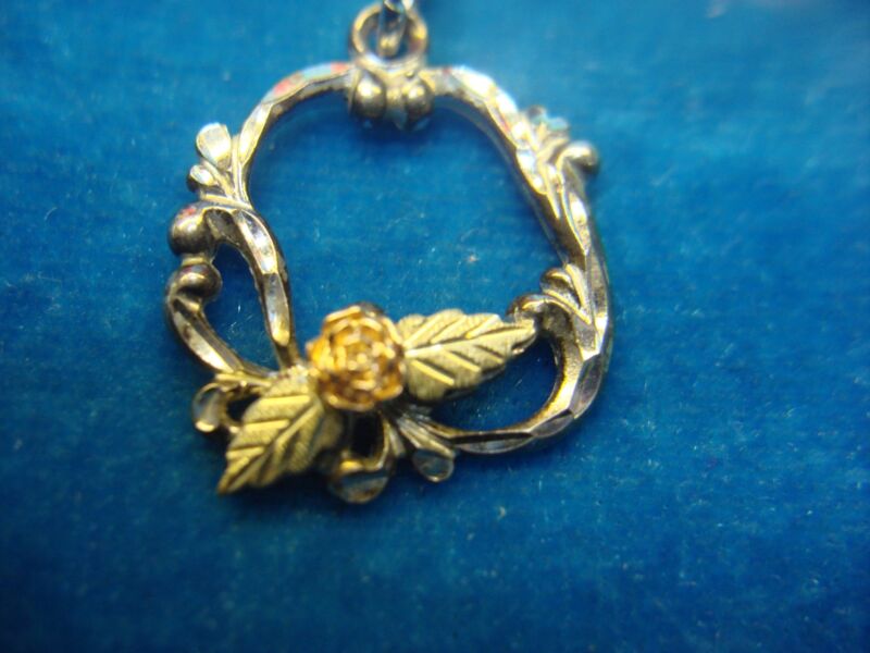 Sterling silver and 12K gold floral pendant or charm, tri-color design