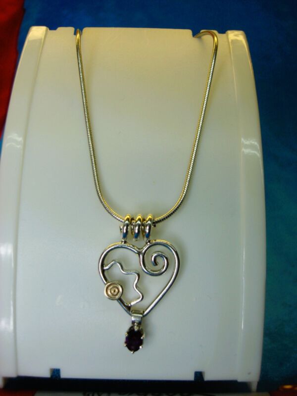 Sterling silver heart pendant necklace with 14K gold flower and amethyst slide