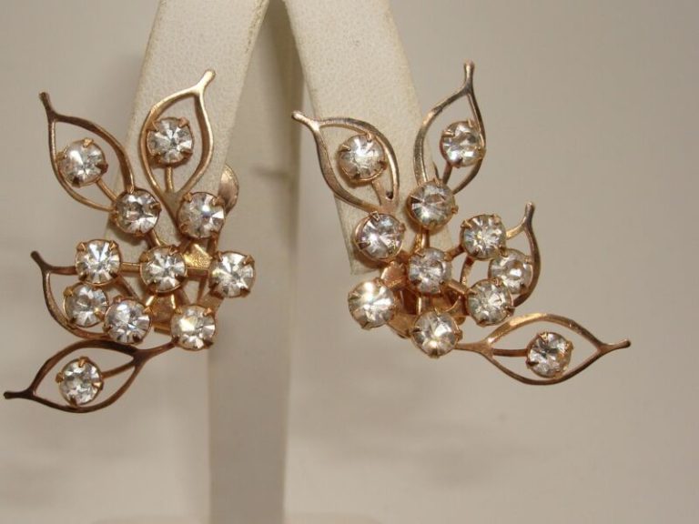 Vintage 1950s-60s gold tone clip-on earrings with foiled rhinestone leaf design
