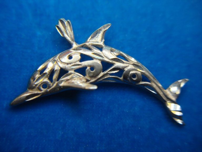 Sterling silver dolphin pendant with diamond cut accents