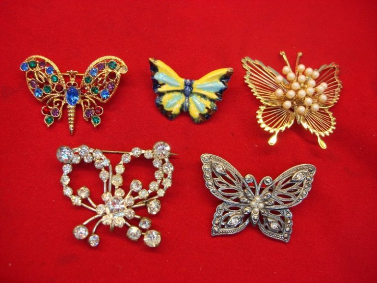 Vintage butterfly pin collection of five enamel pins.