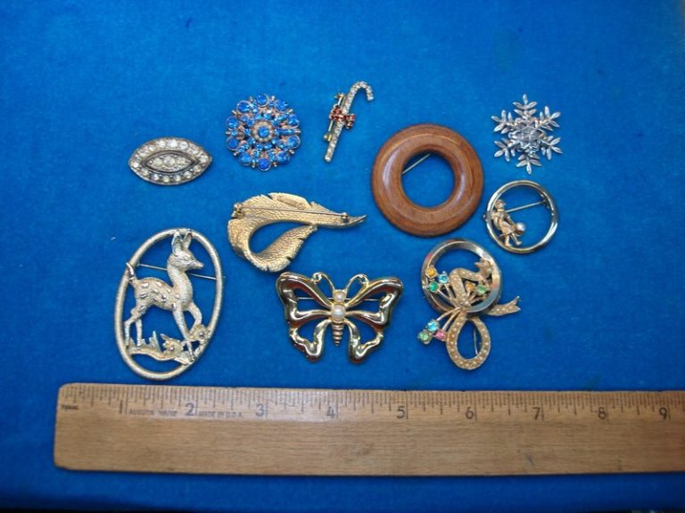 Lot of 10 vintage costume pins, unique designs and collectible accessories