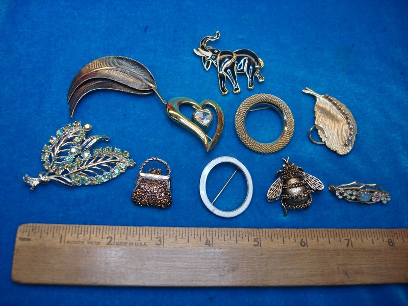 Set of 10 unique and collectible estate jewelry pins