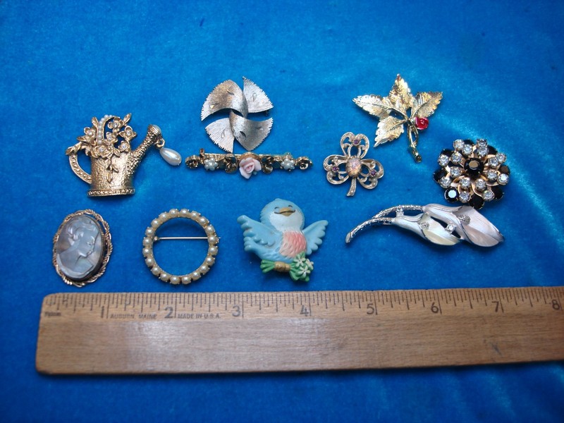 Lot of 10 vintage costume pins with unique retro designs