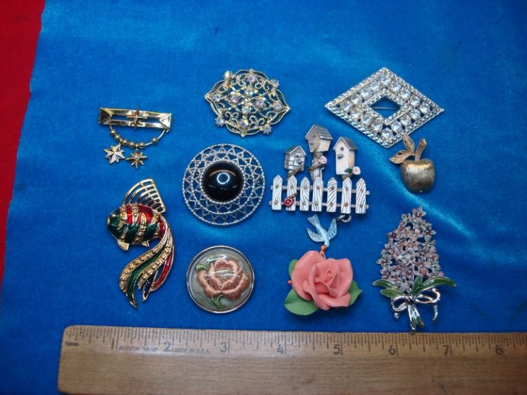 Set of ten unique vintage costume pins in excellent condition