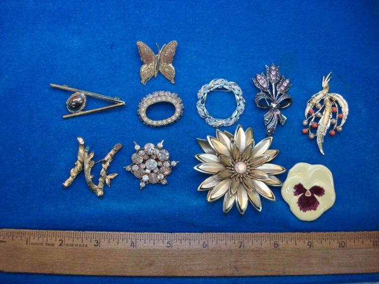 Set of ten vintage costume pins