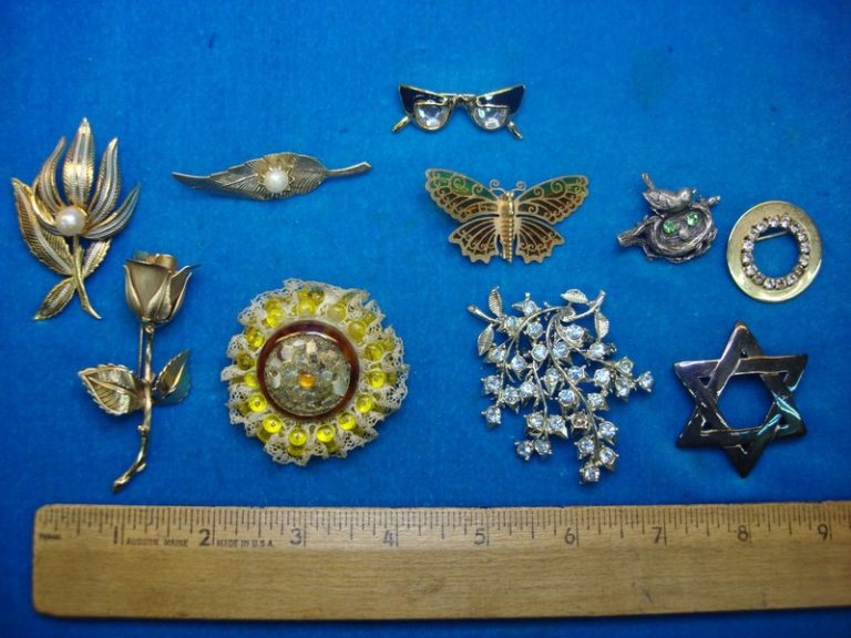 Lot of 10 vintage costume pins with unique designs