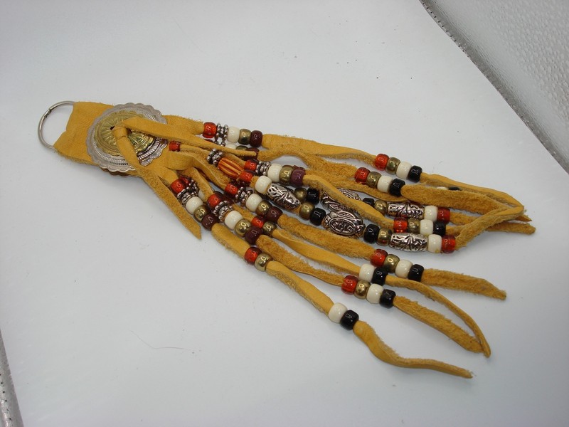 Vintage Native American rawhide key ring with beads and silver conchos