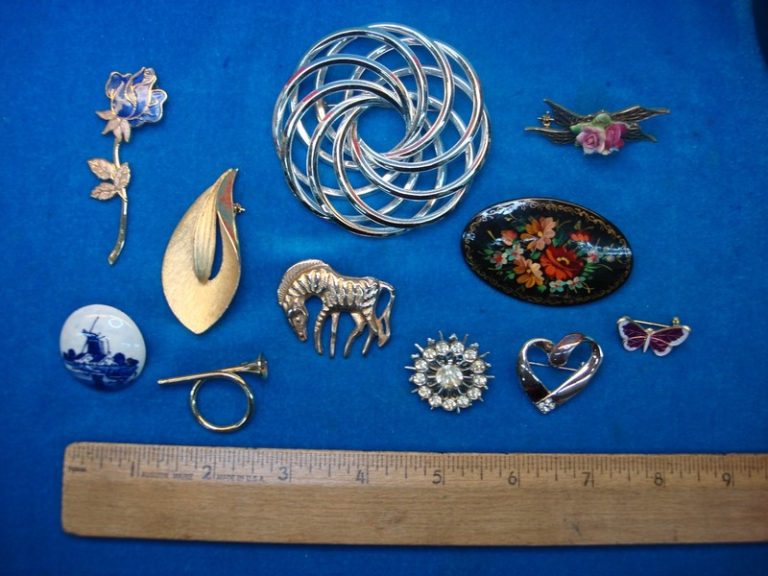 Vintage costume pin collection of 10 unique and usable estate jewelry pins.