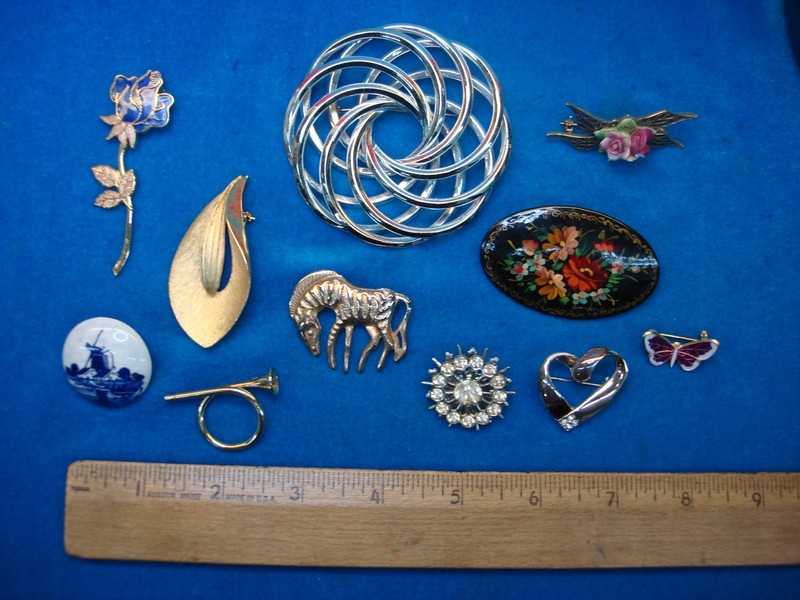 Vintage costume pin collection of 10 unique and usable estate jewelry pins.