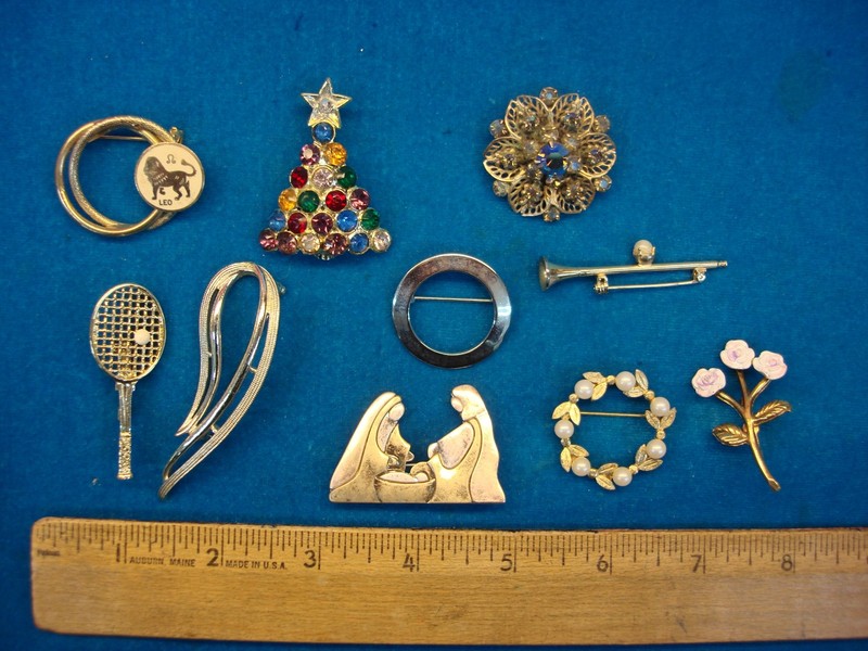 Set of ten vintage costume pins