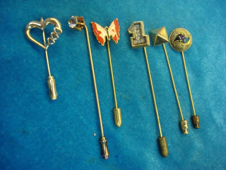 Collection of six vintage stick pins
