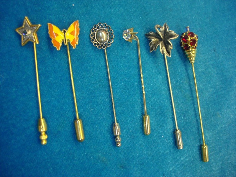 Collection of six vintage stick pins
