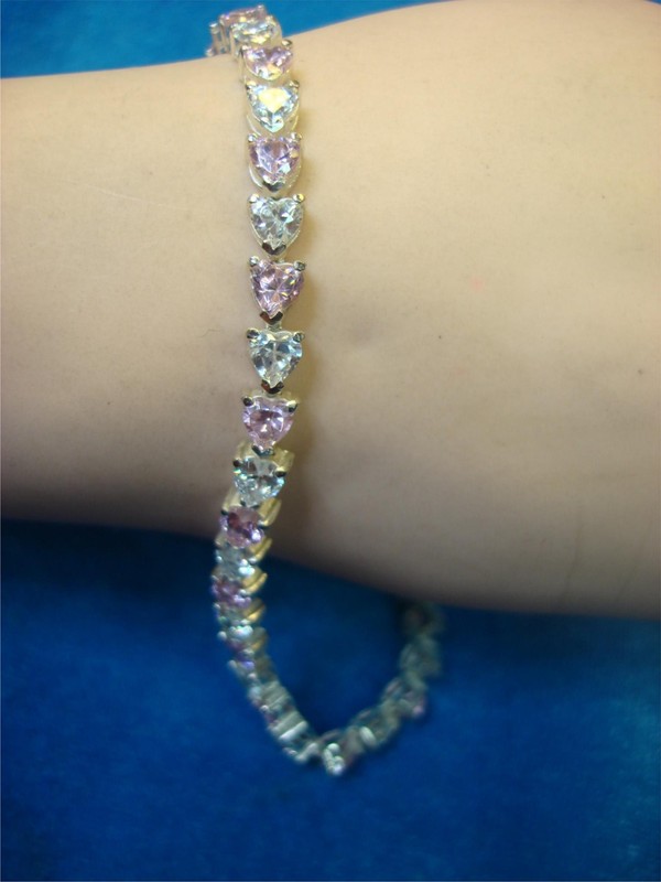Sterling silver heart bracelet with pink and clear CZ stones, size 8