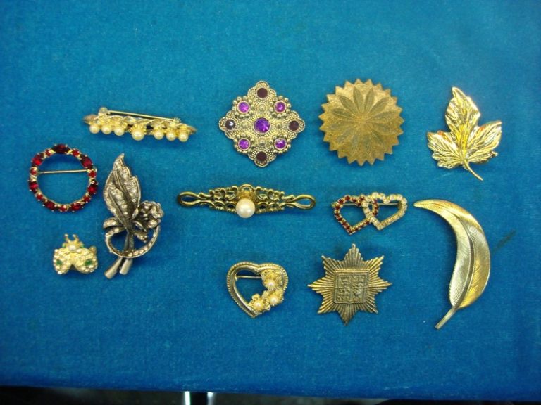 Lot of 12 vintage costume pins in unique designs