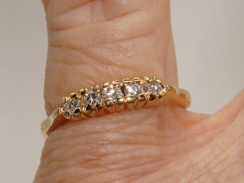 14K gold diamond band ring, size 6.5