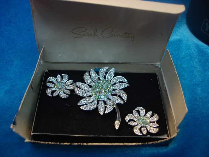 Vintage Sarah Coventry pin and clip-on earring set with sparkling clear stones in original unworn condition.