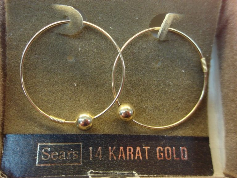Vintage Sears 1" gold hoop earrings with a floating ball design