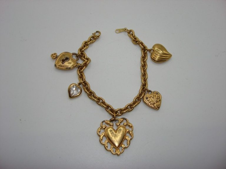 Vintage gold-tone puffy heart charm bracelet with unique openwork design