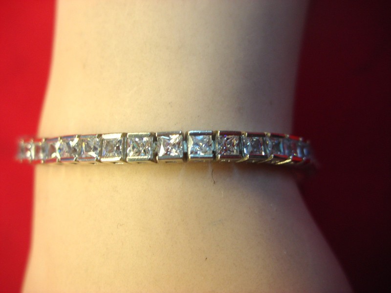 Sparkling sterling silver bracelet with square clear stones, pre-owned (7.5 inch)