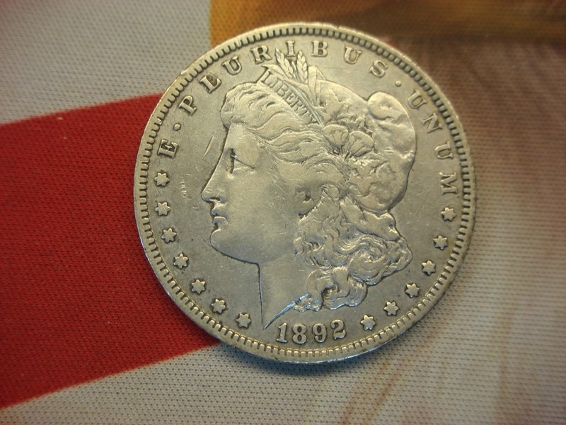 1892-O Morgan Dollar with strong details and a solid rim.