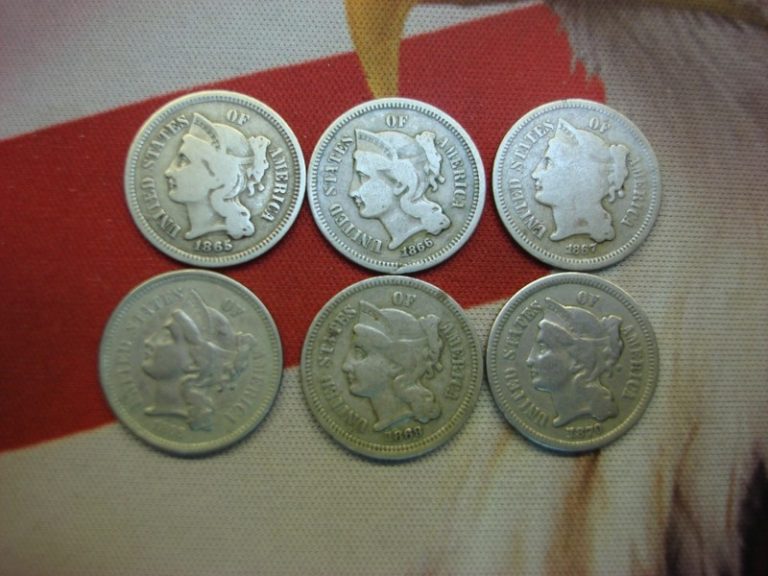Six vintage US three cent nickels from 1865-1870, different dates, nice condition.