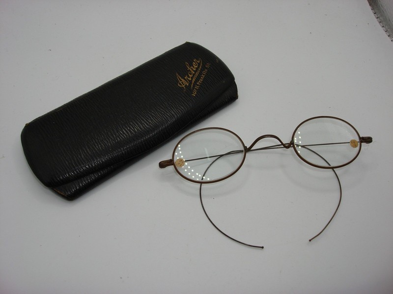 Antique Victorian child's eyeglasses in original leather case with '22' stickers