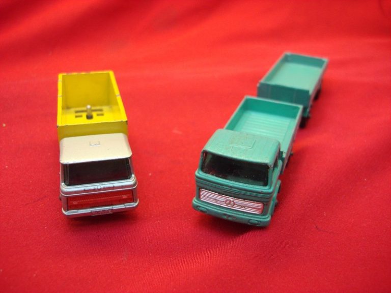 Vintage Matchbox Lesney truck trio: No. 47C Tipper Container Truck, No. 1E Mercedes Truck, and No. 2D Mercedes Trailer