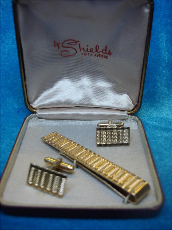Vintage gold tone cufflinks and tie clip set by Shields Fifth Avenue