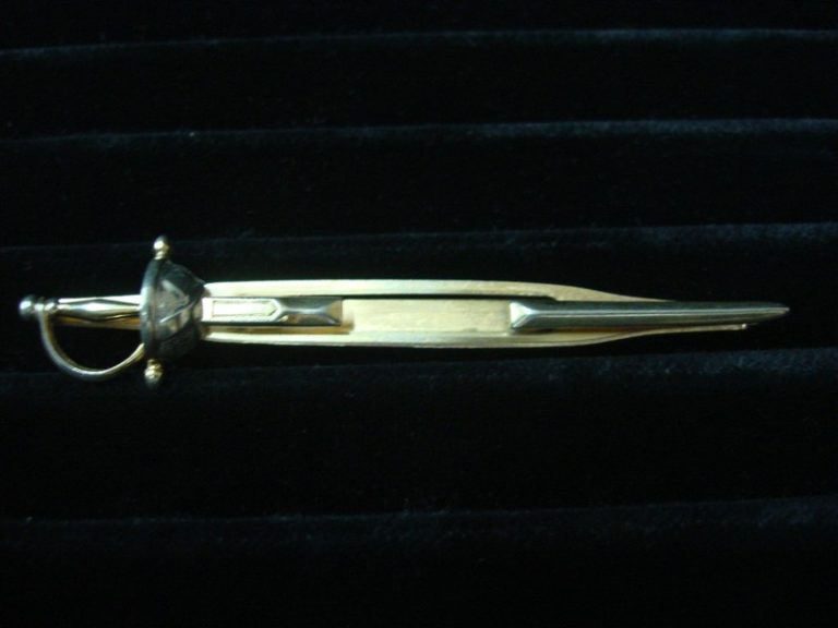 Vintage Swank gold tone sword tie bar clip with silver accents