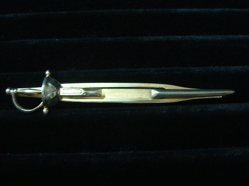 Vintage Swank gold tone sword tie bar clip with silver accents